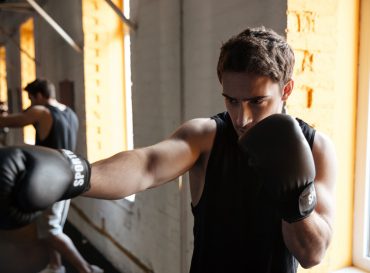 strong-boxer-training-in-a-gym-PU9BNVV.jpg